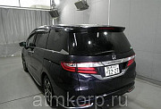 Минивэн 4WD 8 мест Honda Odyssey кузов RC2 пятого поколения Absolute EX гв 2013 пробег 157 т.км темн Москва