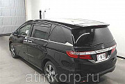 Минивэн 4WD 8 мест Honda Odyssey кузов RC2 пятого поколения модификация G EX гв 2014 пробег 76 т.км  Москва