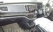 Минивэн 4WD 8 мест Honda Odyssey кузов RC2 пятого поколения Absolute EX AWD гв 2014 пробег 168 т.км  Москва
