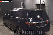 Минивэн 8 мест Honda Odyssey кузов RC1 пятого поколения Absolute EX гв 2014 пробег 72 т.км фиолетовы Москва