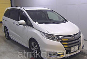 Минивэн 8 мест Honda Odyssey кузов RC1 пятого поколения Absolute гв 2014 пробег 25 т.км белый жемчуг Москва