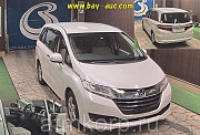 Минивэн 8 мест Honda Odyssey кузов RC1 пятого поколения B гв 2014 пробег 119 т.км белый Москва