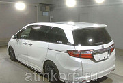 Минивэн 8 мест Honda Odyssey кузов RC1 пятого поколения Absolute гв 2014 пробег 78 т.км белый Москва