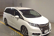 Минивэн 8 мест Honda Odyssey кузов RC1 пятого поколения Absolute EX гв 2015 пробег 51 т.км белый Москва