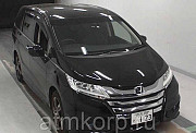Минивэн 8 мест Honda Odyssey кузов RC1 пятого поколения модификация G гв 2015 пробег 30 т.км черный Москва
