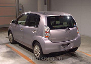 Хэтчбек TOYOTA PASSO цвет розовый металлик Москва
