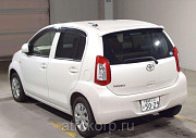 Хэтчбек TOYOTA PASSO цвет белый год выпуска  2014 Москва