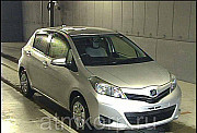 Хэтчбек TOYOTA VITZ год выпуска  2012 цвет светло серый Москва