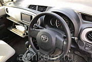 Хэтчбек TOYOTA VITZ год выпуска  2012 цвет  серебристый Москва